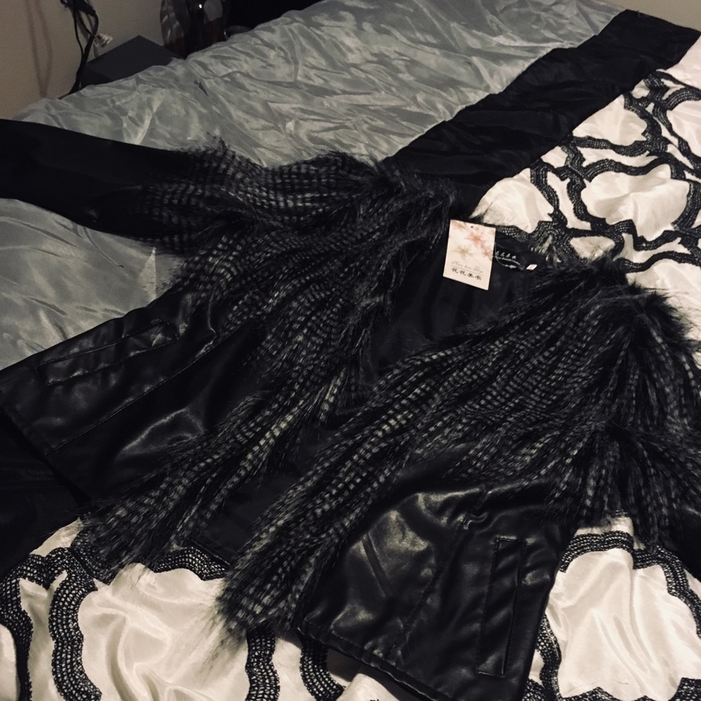 A Pleather jacket, with imitation fur